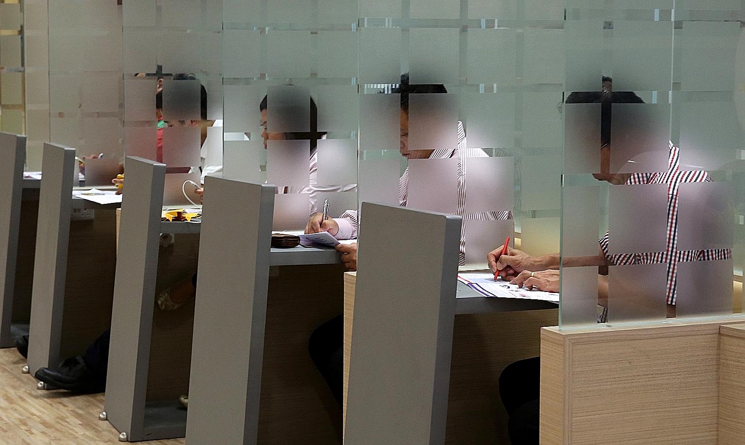 Donors completing a questionnaire before donating blood. Personal information of more than 800,000 blood donors was put online improperly for over two months by a vendor of the Health Sciences Authority.