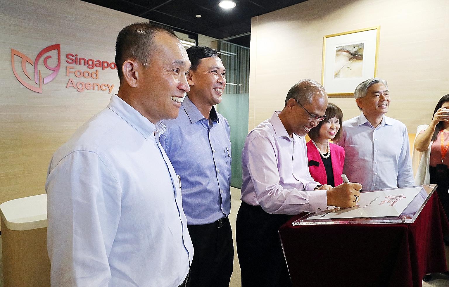Minister for the Environment and Water Resources Masagos Zulkifli (third from left) at the launch of the new Singapore Food Agency (SFA) yesterday, with (from left) SFA chairman Lim Chuan Poh, SFA chief executive Lim Kok Thai, Senior Minister of Stat