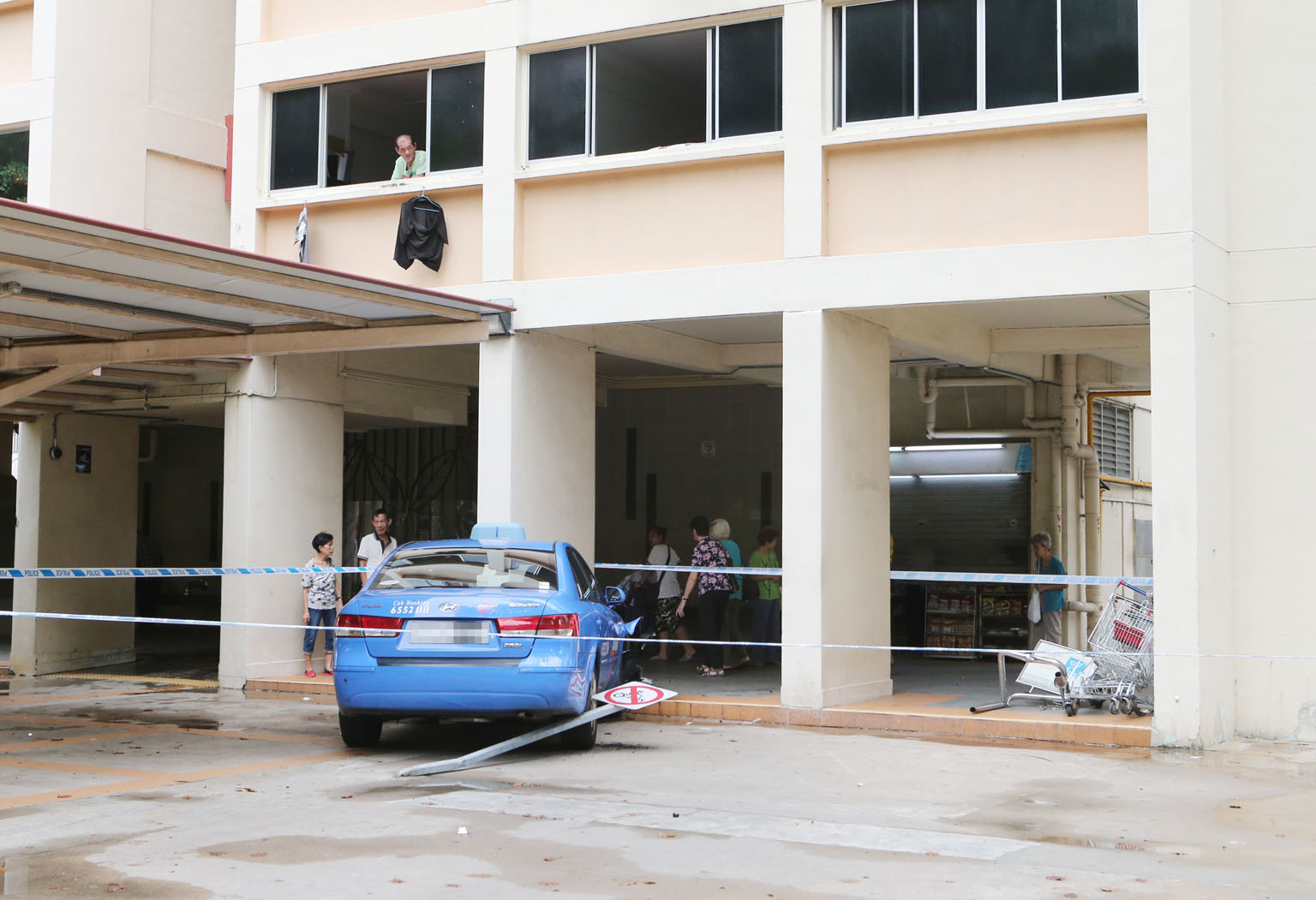 After the collision between the two cabs, the Comfort taxi had mounted the pavement before coming to a stop at the void desk of Block 175 in Toa Payoh Lorong 2. A ComfortDelGro spokesman said there were no passengers on board the Comfort taxi and no 