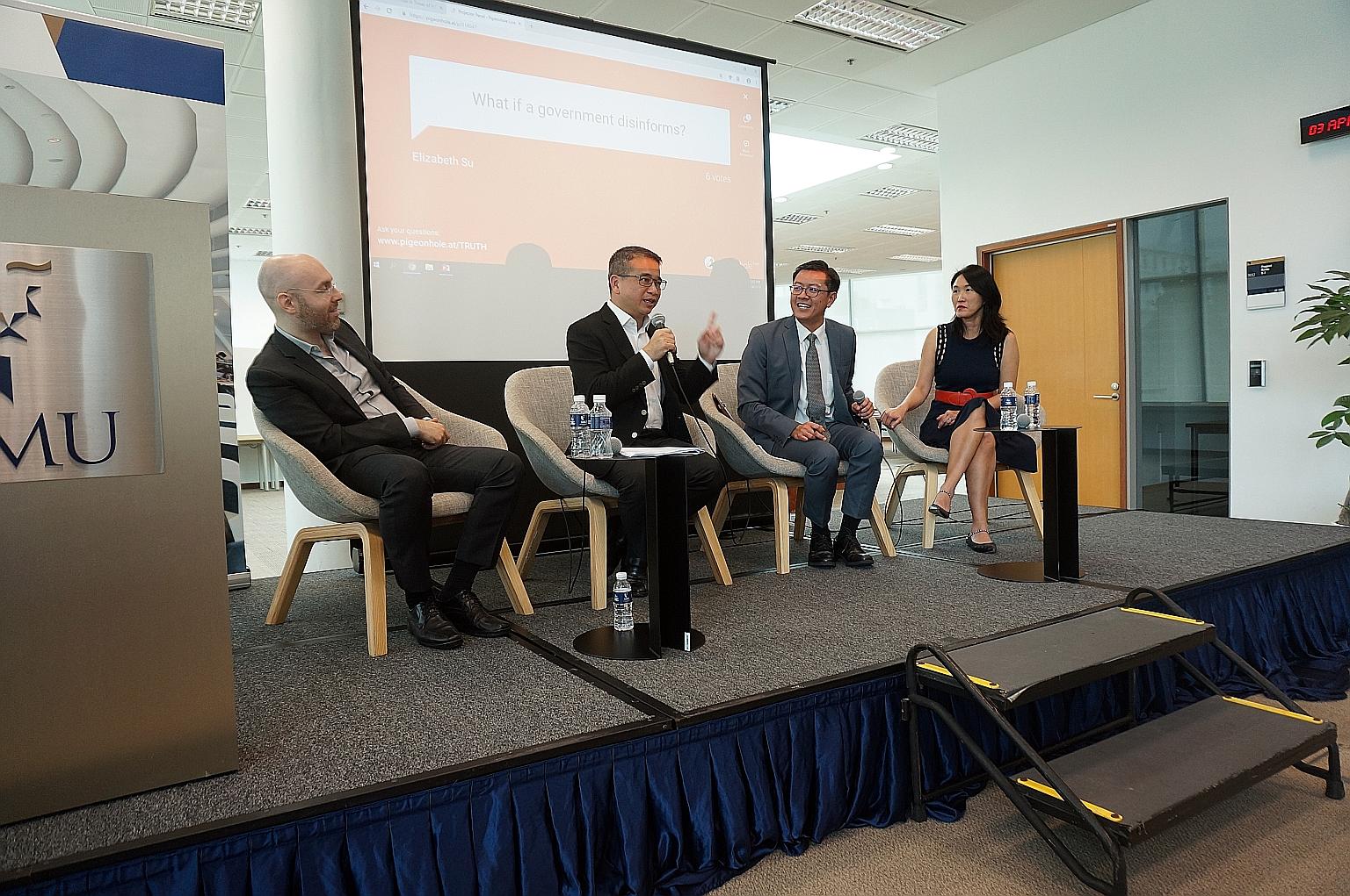 (From left) Singapore Management University (SMU) assistant professor of sociology Michael Genkin, Senior Minister of State for Law and Health Edwin Tong, SMU associate professor of law Eugene Tan and Singapore University of Technology and Design pro