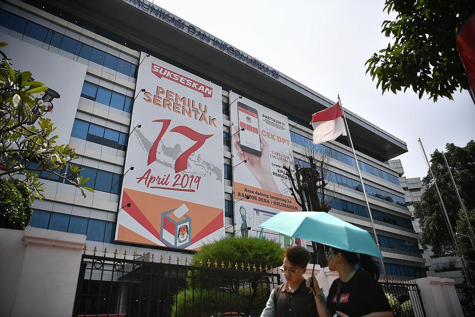 An election poster hanging outside the Ministry of Communication and Information Technology in Central Jakarta, Indonesia. Rumours abound as polling day approaches, with the General Elections Commission accused of vote rigging and the Indonesian air 