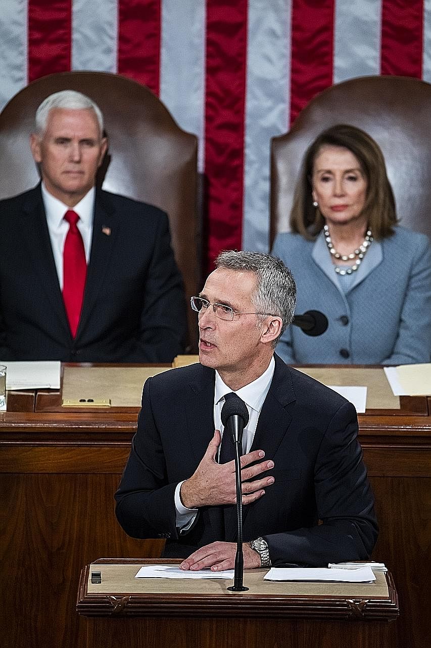 Nato secretary-general Jens Stoltenberg addressing the US Congress in Washington on Wednesday, with US Vice-President Mike Pence and House Speaker Nancy Pelosi looking on. Mr Stoltenberg cited how Nato partners came to the aid of the US after the Sep