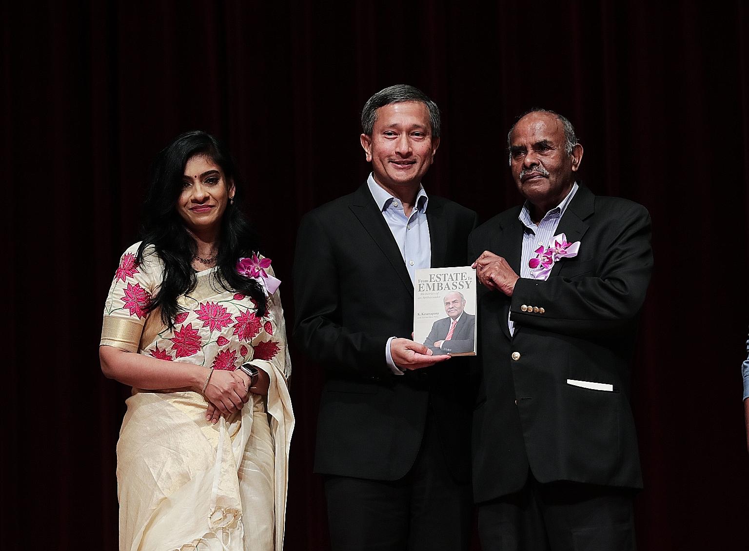 Foreign Minister Vivian Balakrishnan and veteran diplomat K. Kesavapany (right) at the launch of the former high commissioner's biography. The book is co-authored by applied linguist Anitha Devi Pillai (left).