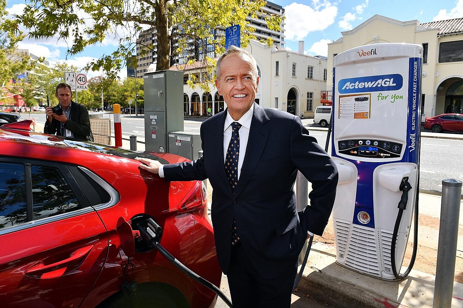 Labor leader Bill Shorten charging an electric car on April 1. The opposition party proposes building 200 fast-charging stations.