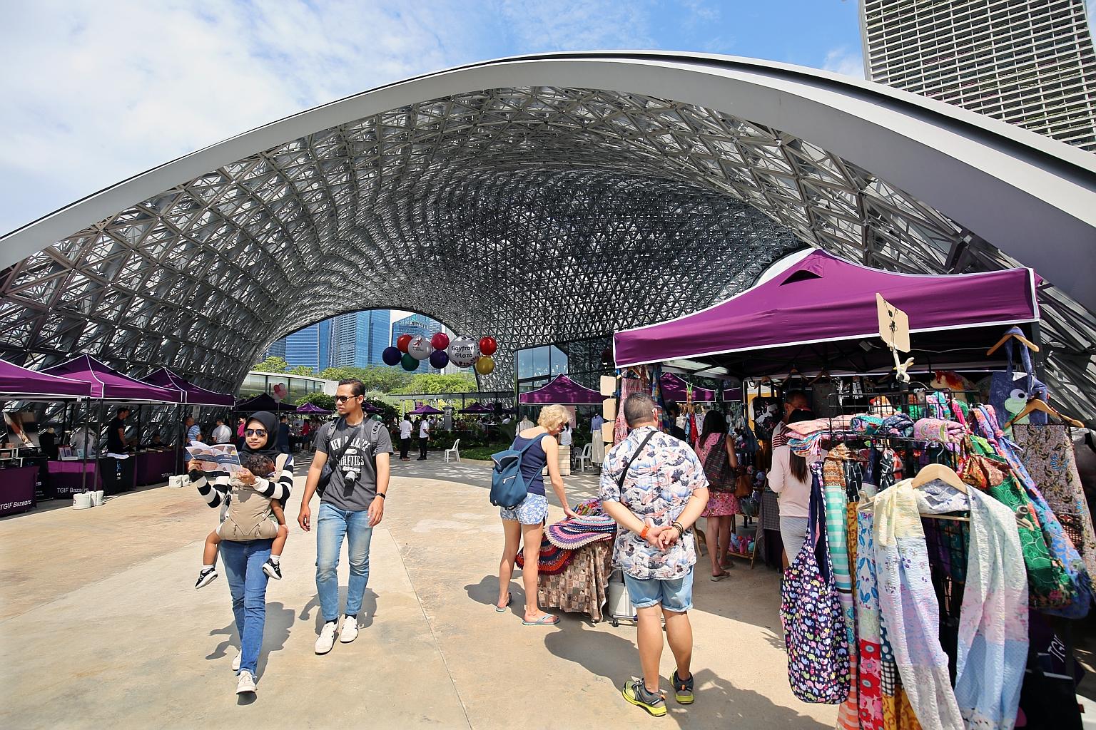 The newly launched 5,000 sq m Bayfront Plaza houses a new floral attraction and community spaces that will host a weekend market.