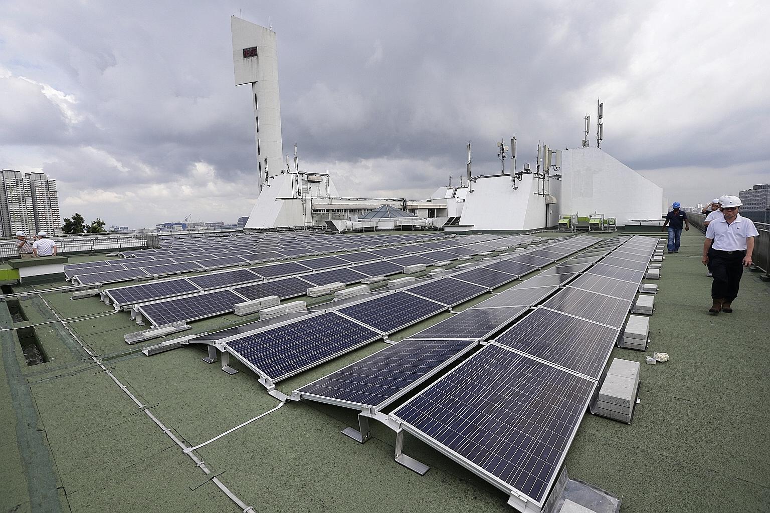 Solar panels on the rooftop of Jurong Town Hall. Under the memorandum of understanding, the Energy Market Authority and the United States' Federal Energy Regulatory Commission will share regulatory practices and explore how best to keep energy system