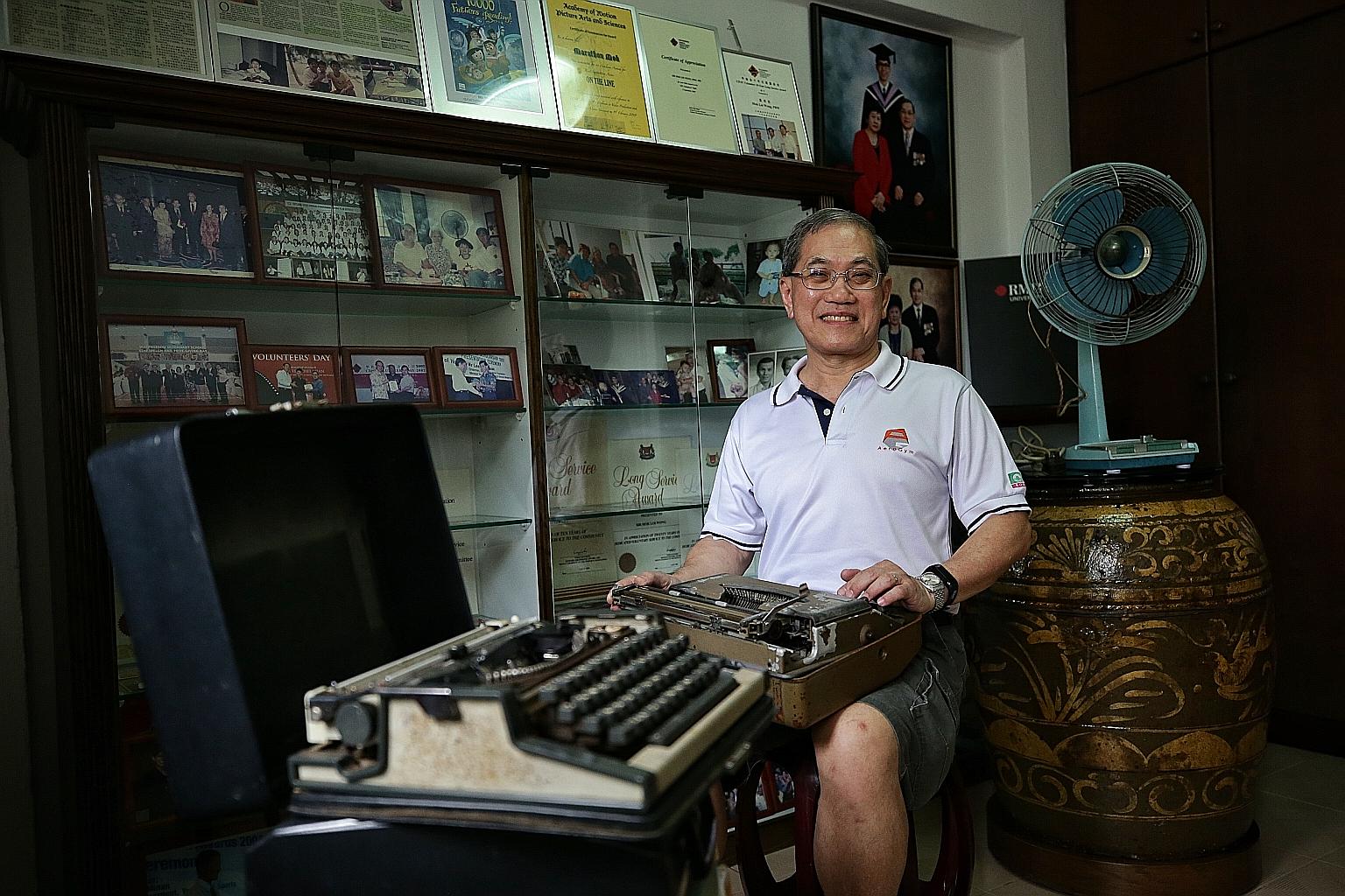 Mr Mok Loi Wong, 65, with his memorabilia from yesteryear - old typewriters, an electric fan and earthenware. Born in 1953 in a kampung in Jalan Ubi, Mr Mok grew up in a wooden hut with an earthen floor and no electricity, and spent most of his free 
