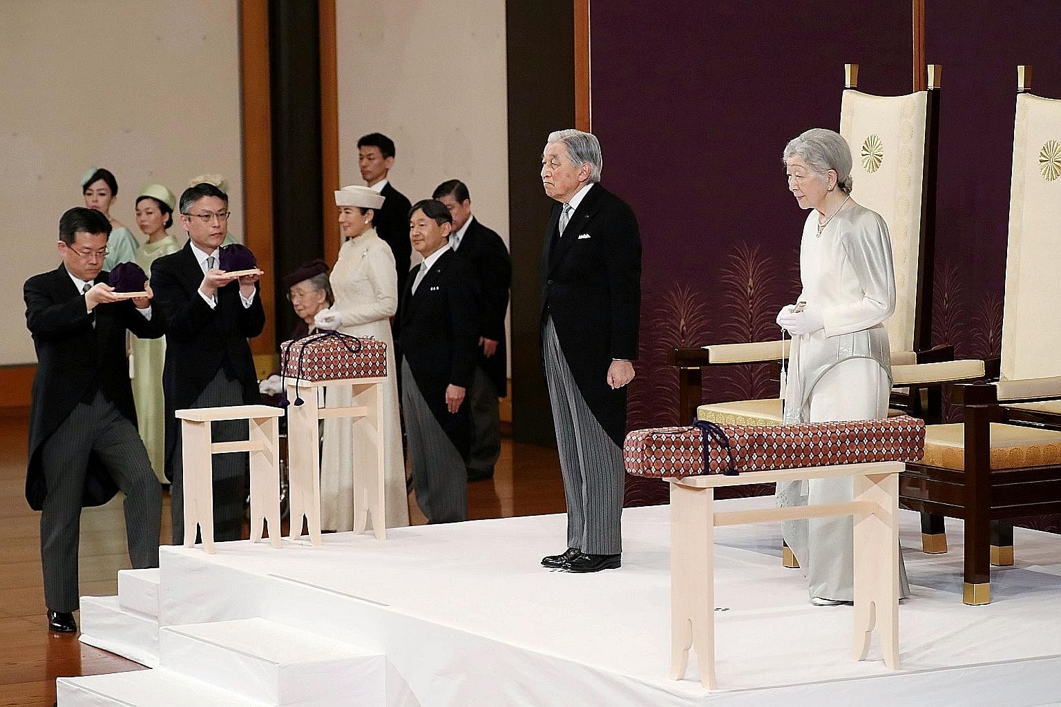Japan's Emperor Akihito and Empress Michiko, together with Crown Prince Naruhito and Crown Princess Masako, attending the abdication ceremony at the State Room in the Imperial Palace in Tokyo yesterday. Emperor Akihito, 85, in his final remarks as hi