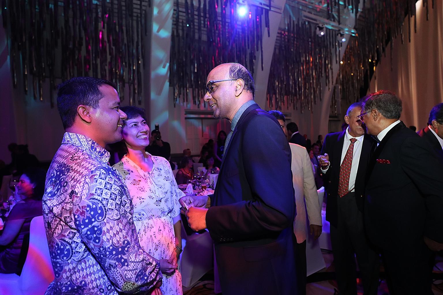 Senior Minister and Coordinating Minister for Social Policies Tharman Shanmugaratnam with Tanjong Pagar GRC MP Joan Pereira and Holland-Bukit Timah GRC MP Christopher De Souza, at the Eurasian Association's fund-raising dinner last night.