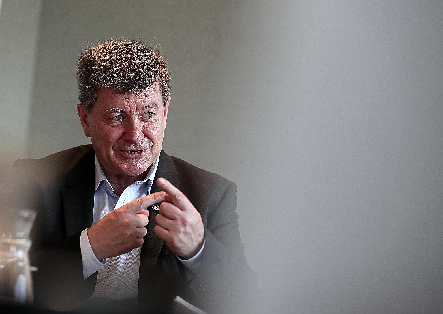 International Labour Organisation director-general Guy Ryder is less concerned about jobs being lost to technology than the challenges in preparing workers so they can function in the new economy. ST PHOTO: KELVIN CHNG