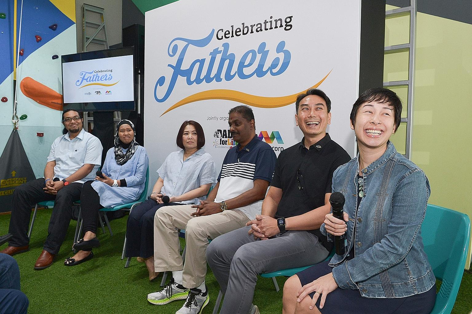 Couples sharing their parenting experiences at the launch of Celebrating Fathers yesterday. (From left) Senior parts officer Mohamad Umar Mohamed Mossudiq and his wife, Madam Nor Aisha Mohamed Jupri; Ms Kanjana Maniam and her husband, civil servant G