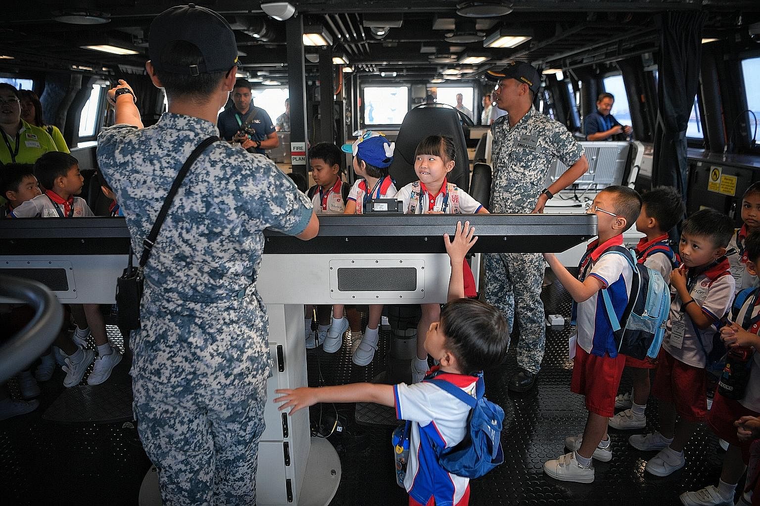 Excited pre-schoolers from PCF Sparkletots were shown around the Integrated Command Centre during a tour of the littoral mission vessel RSS Fortitude at the RSS Singapura-Changi Naval Base yesterday. The group of 29 children aged four to six then vis