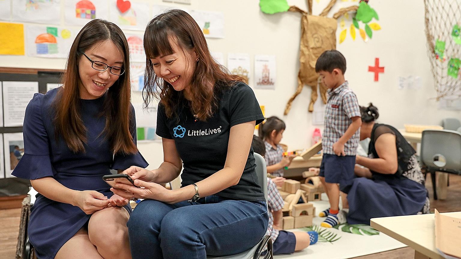 LittleLives app founder Sun Ho (right) with principal of E-Bridge Pre-School (Bukit Panjang), Ms Chua Chai Yun. LittleLives, a pre-school management app, has launched a payment feature that will save pre-school operators up to 40 hours a month on pay