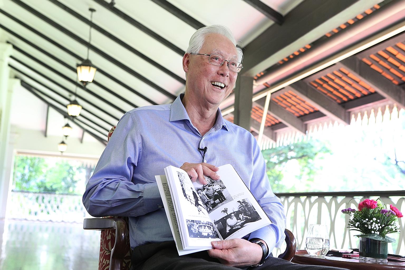 Emeritus Senior Minister Goh Chok Tong with a Chinese-language copy of his biography, Tall Order: The Goh Chok Tong Story, during an interview at the Istana with Lianhe Zaobao that was published in the Chinese daily yesterday. PHOTO: LIANHE ZAOBAO