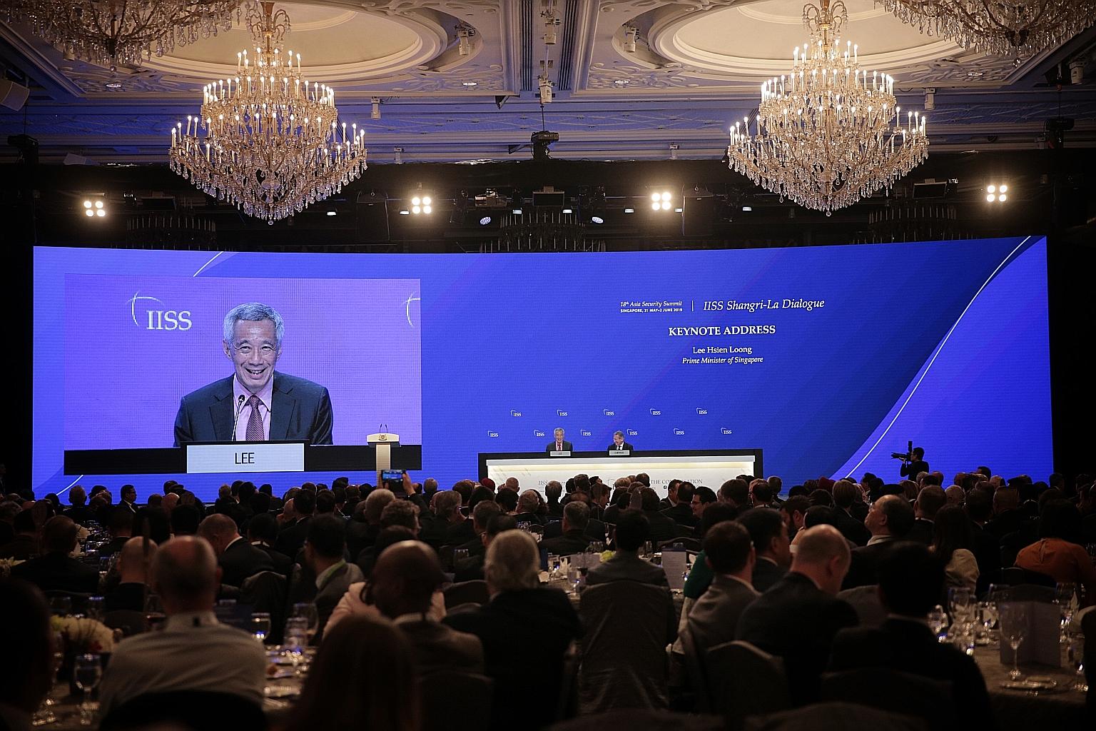 Prime Minister Lee Hsien Loong at a question and answer session after delivering the keynote address at the Shangri-La Dialogue last night. PM Lee said it is natural that the United States and China will "vie for power and influence, but competition