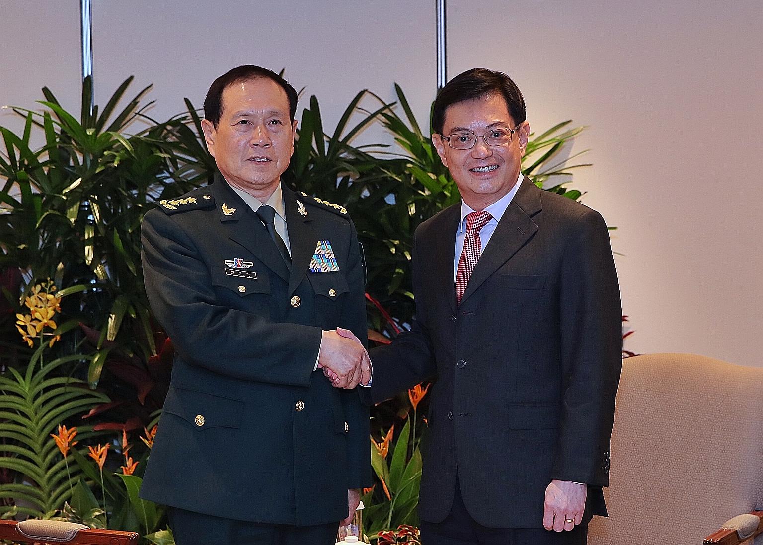 Chinese Defence Minister and State Councillor Wei Fenghe met Deputy Prime Minister Heng Swee Keat on the sidelines of the Shangri-La Dialogue yesterday. General Wei, who is also on an introductory visit to Singapore, congratulated Mr Heng on his new 