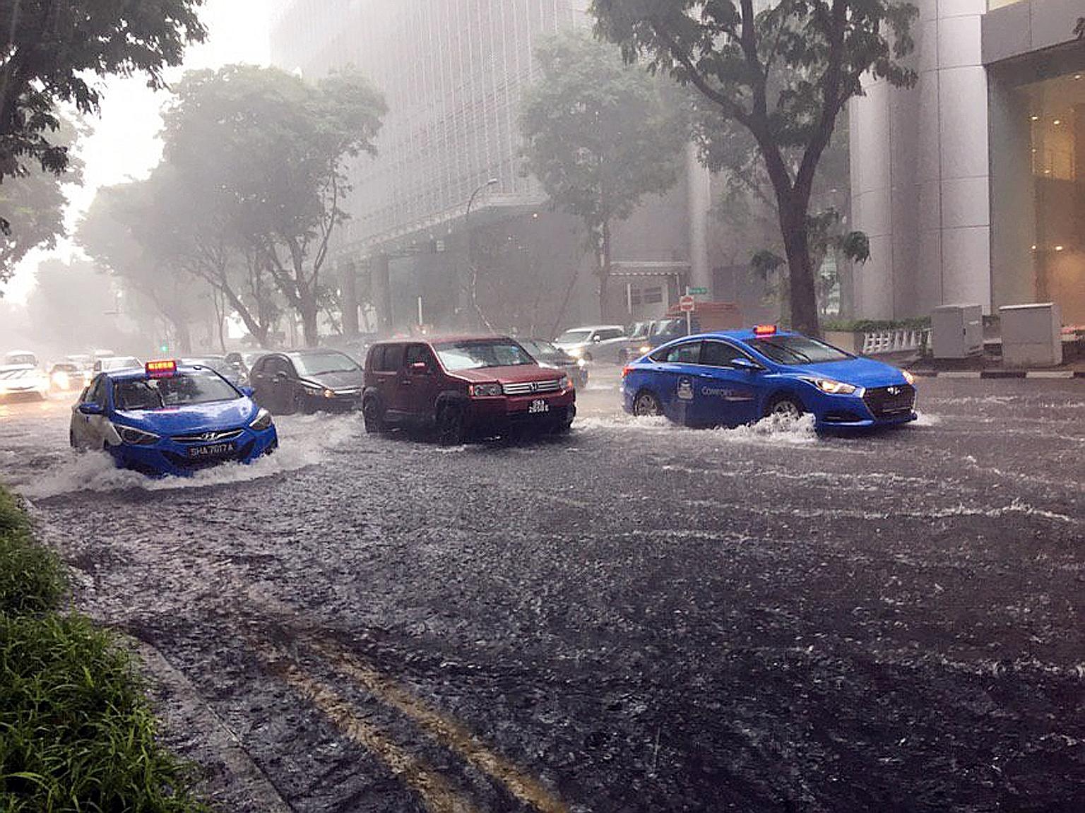Pickering Street was among the areas hit by a heavy downpour at about 1.30pm yesterday. Meanwhile, moderate to heavy showers were reported mostly in Queenstown, Kallang and the city area. The Weather@SG app by the Meteorological Service Singapore (MS