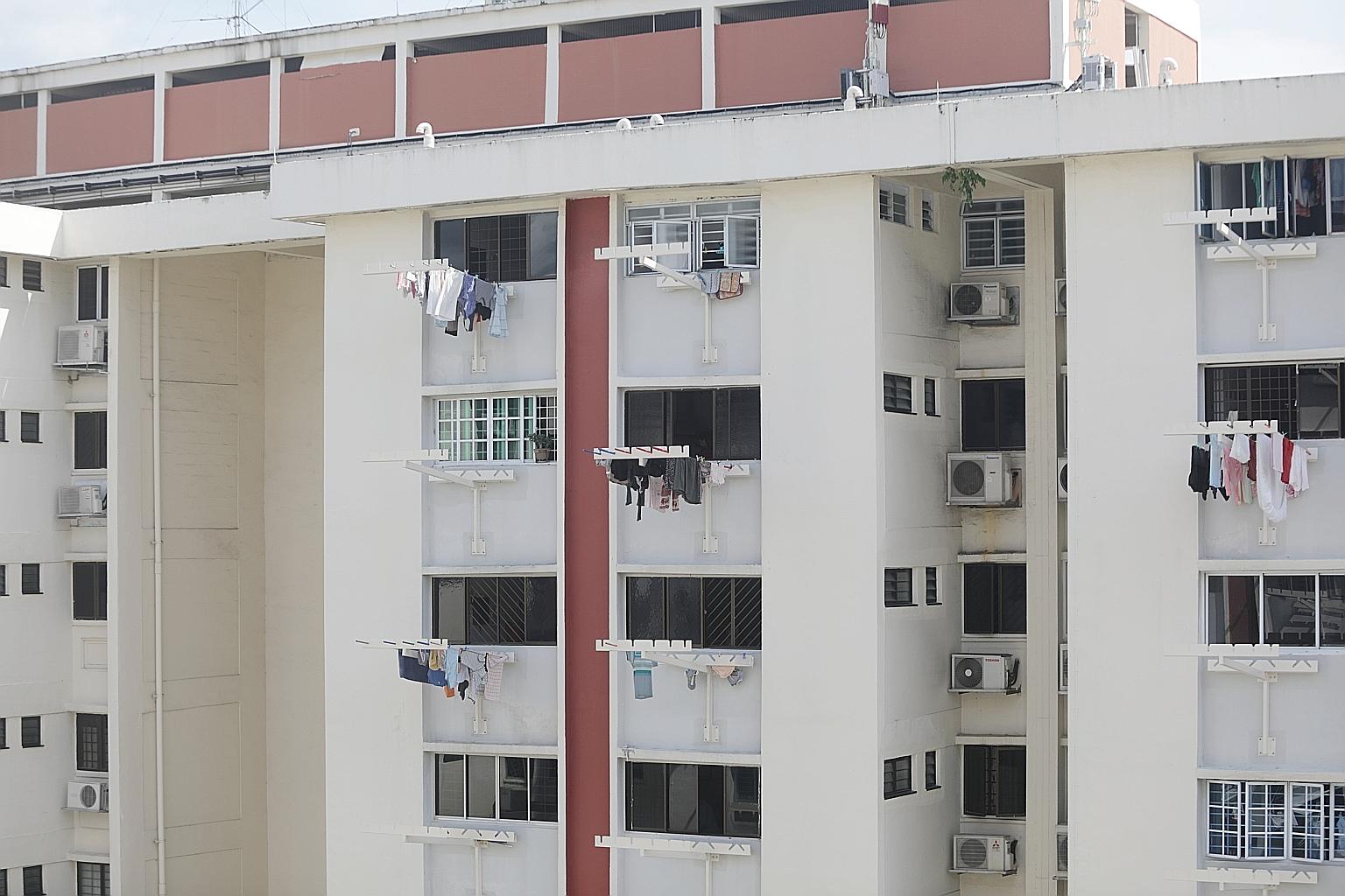 Ms Letecia, who works as a maid in a unit opposite Block 637 Ang Mo Kio Avenue 6, said the girl was spotted in the kitchen (far left, second unit from top) where the window grilles were open. PHOTO: LIANHE ZAOBAO