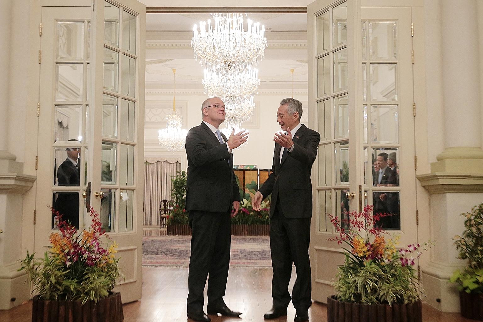 Prime Minister Lee Hsien Loong with Australian Prime Minister Scott Morrison at the Istana yesterday. Mr Morrison is on his first overseas trip after winning the Australian federal election last month. ST PHOTO: JASON QUAH