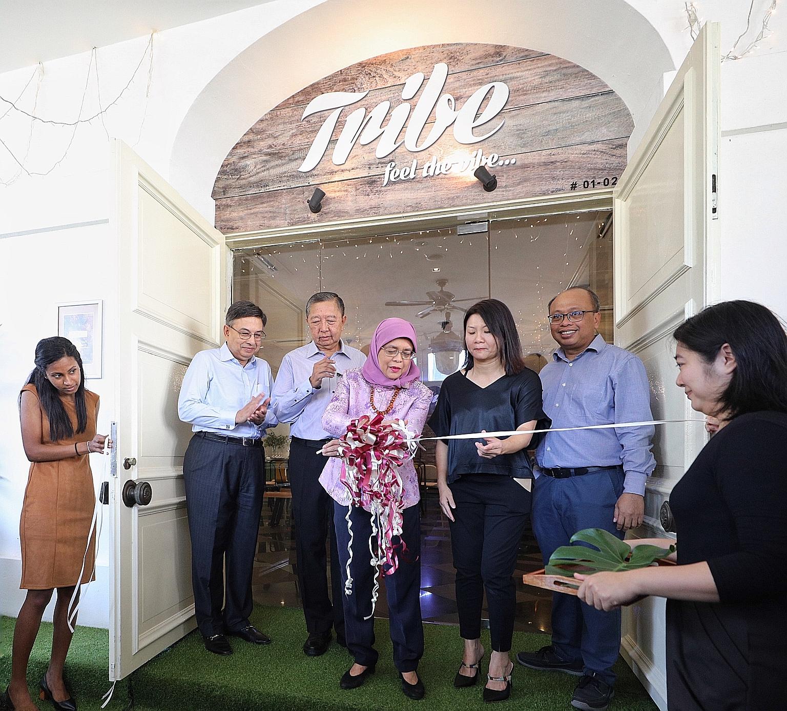 President Halimah Yacob with (from far left) Singapore Centre for Social Enterprise (raiSE) chairman Gautam Banerjee, PCSEA committee chairman Tan Soo Nan, Bliss Group founder Christine Low, and raiSE chief executive Alfie Othman at the official open