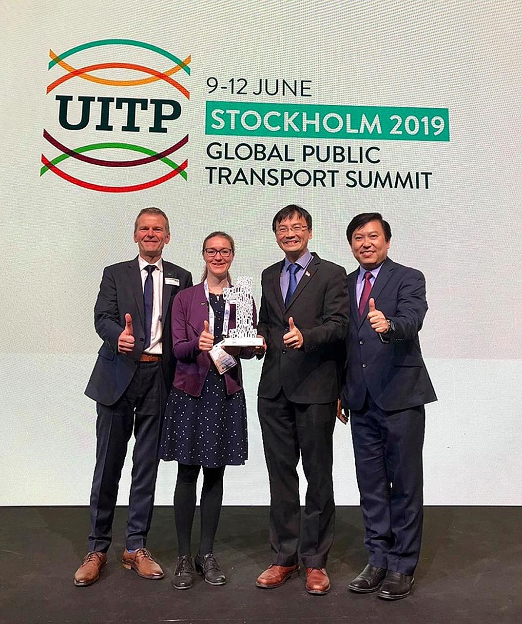 Land Transport Authority chief executive Ngien Hoon Ping (second from right) and deputy chief executive for policy and planning Jeremy Yap receiving the prize in the Diversity and Inclusion category together with Mr Klaus Janke, managing director of 