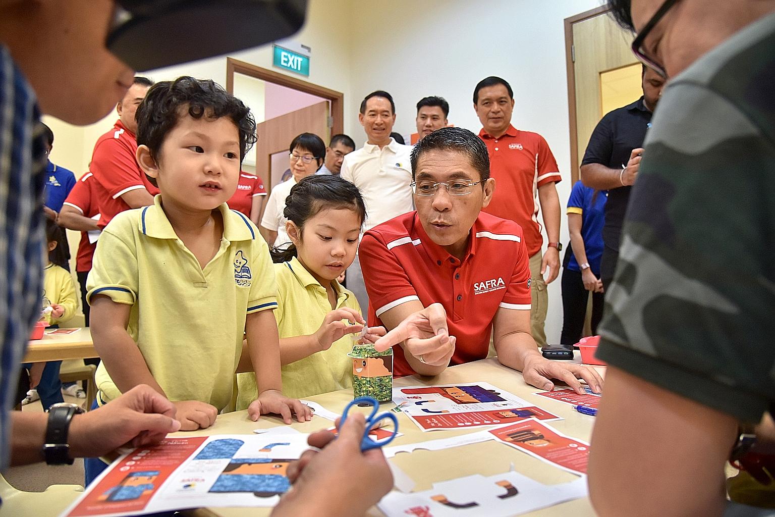 Senior Minister of State for Defence and Safra president Maliki Osman joining children at the Safra Toa Payoh NurtureStars Pre-school for an art-jamming session yesterday. Ahead of SAF Day on July 1, more than 70,000 children from some 500 pre-school