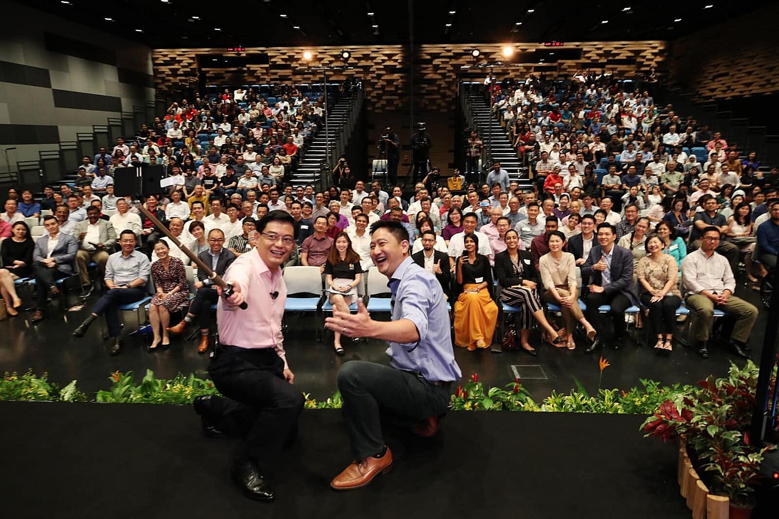 DPM Heng Swee Keat taking a wefie for his maiden Instagram post with Reach-CNA dialogue moderator Steven Chia at SMU's School of Law yesterday. Mr Heng launched his Instagram account at the end of the dialogue.