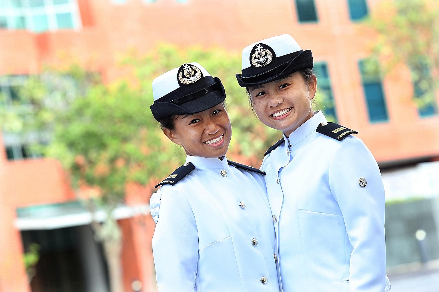 Lieutenant Emily Kwek Zhen Chun (left) with her younger sister, Lieutenant Felicia Kwek Zhen Yi. The former graduated as the top cadet in her cohort.