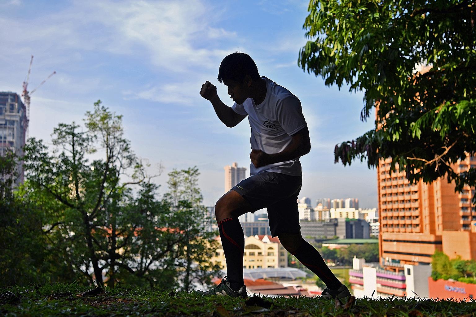 Boxer rolls with the punches: Singaporean pro boxer bouncing back from ...