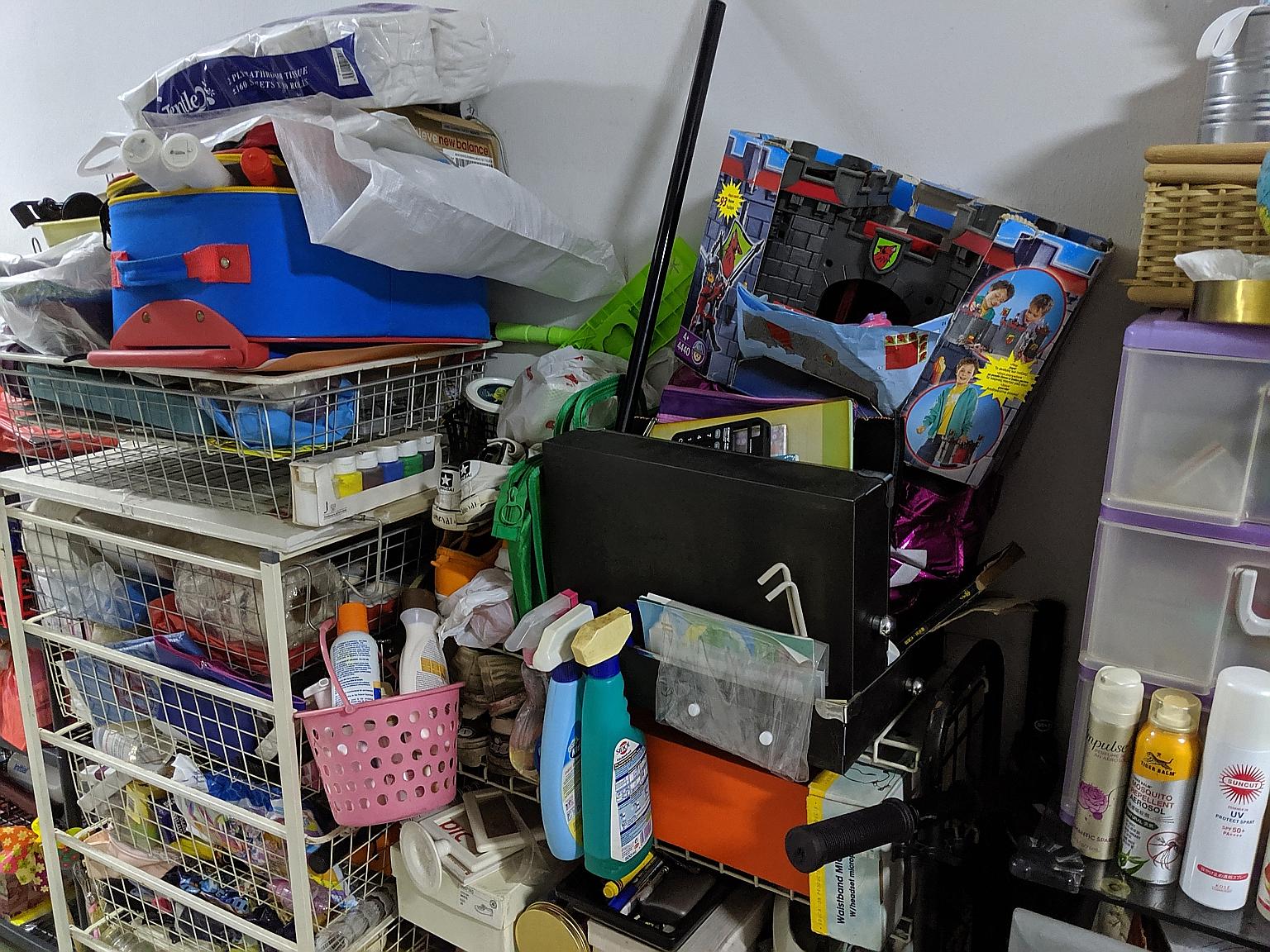 At Block 13 Cantonment Close, neighbours find one resident's clutter an eyesore but do not bring up the issue for fear of worsening relations.