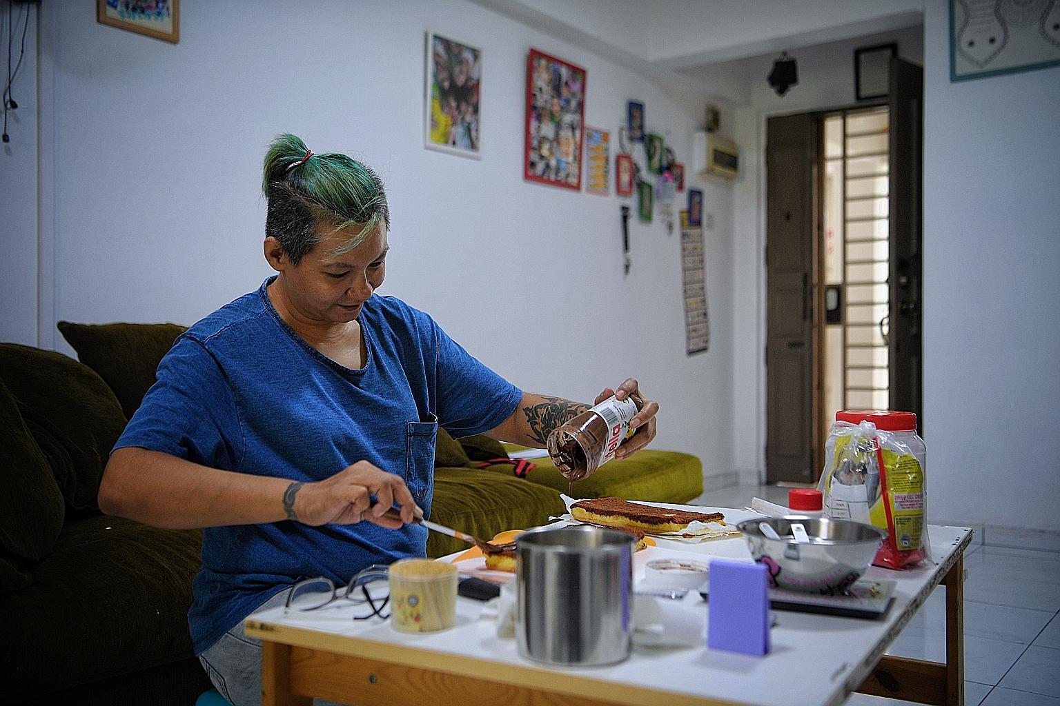 Ms Sabrina Chong Abdullah baking in her home last week. She started abusing drugs at age 11, and was sent to prison several times because of her habit. Now aged 42 and with a supportive husband, she has turned her life around for her six children. She hop