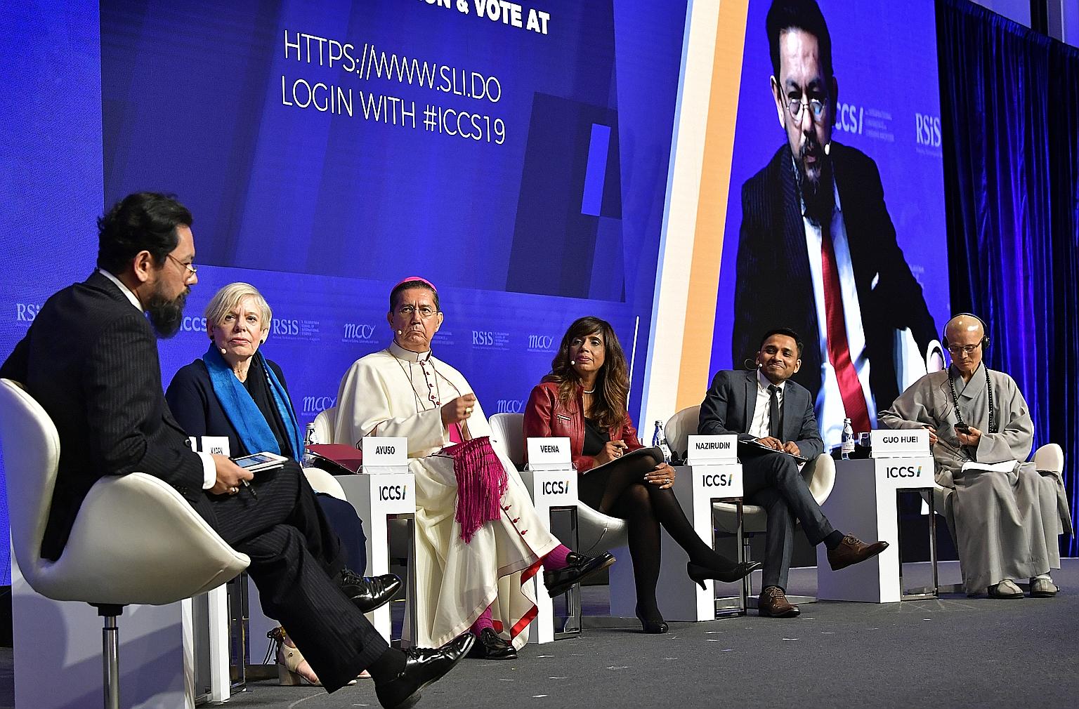 From left: Dr Farish A. Noor, associate professor of the S. Rajaratnam School of International Studies; author Karen Armstrong; Spanish Bishop Miguel Angel Ayuso Guixot, president of the Pontifical Council for Inter-religious Dialogue at the Vatican;