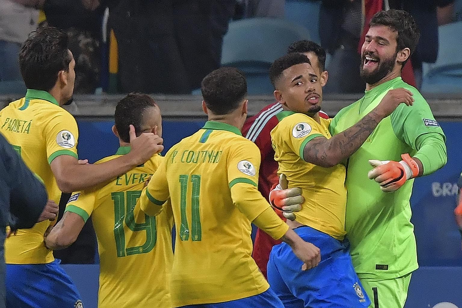 Brazil's Gabriel Jesus (second from right) with goalkeeper Alisson and other teammates after the victory. PHOTO: AGENCE FRANCE-PRESSE