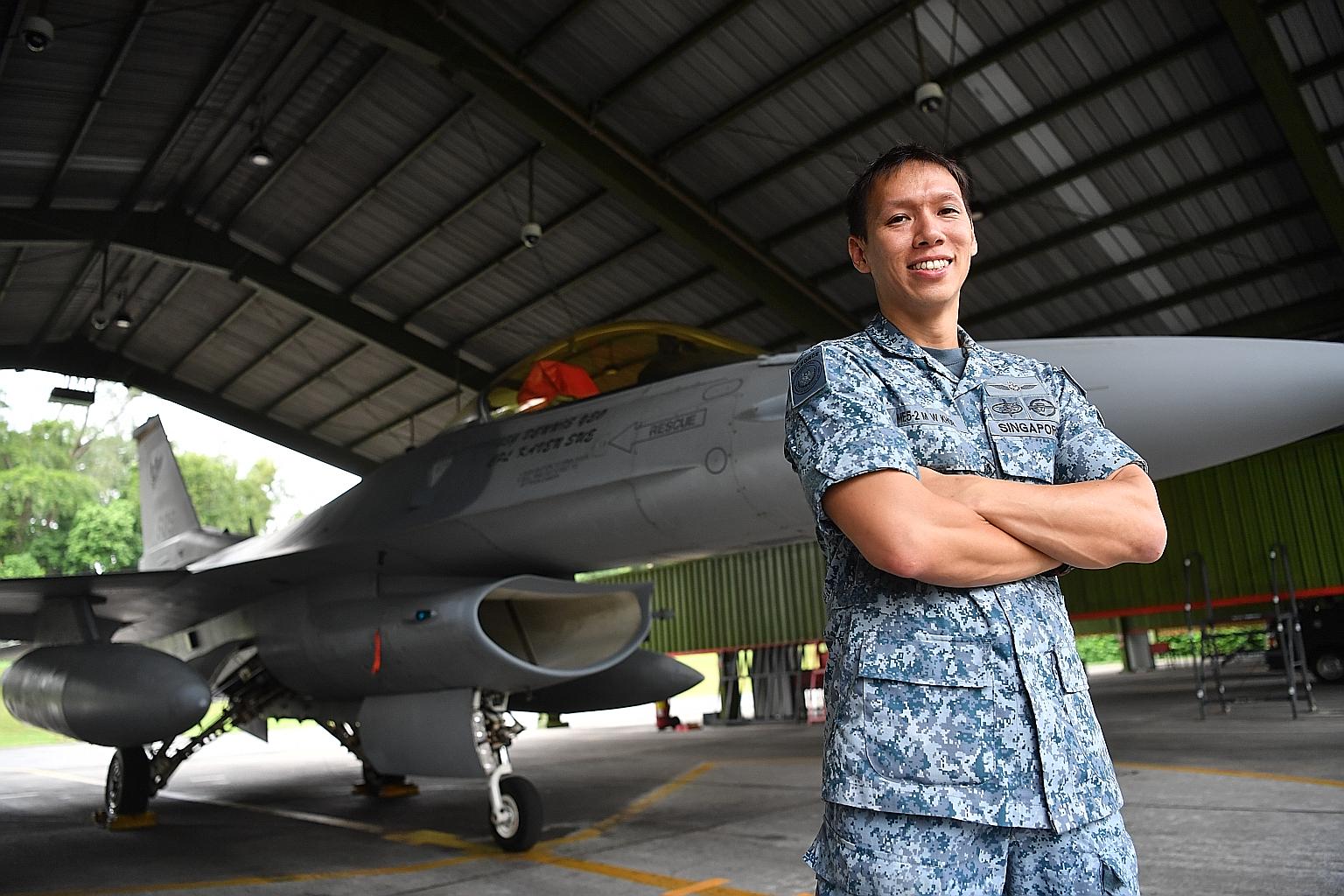 Military Expert 5 Khor Mark Wan, head of Airbase Operability Systems, says the air force has always looked at technology as a force multiplier. He is seen here beside an F-16 fighter jet at Tengah Airbase. PHOTO: MINISTRY OF DEFENCE