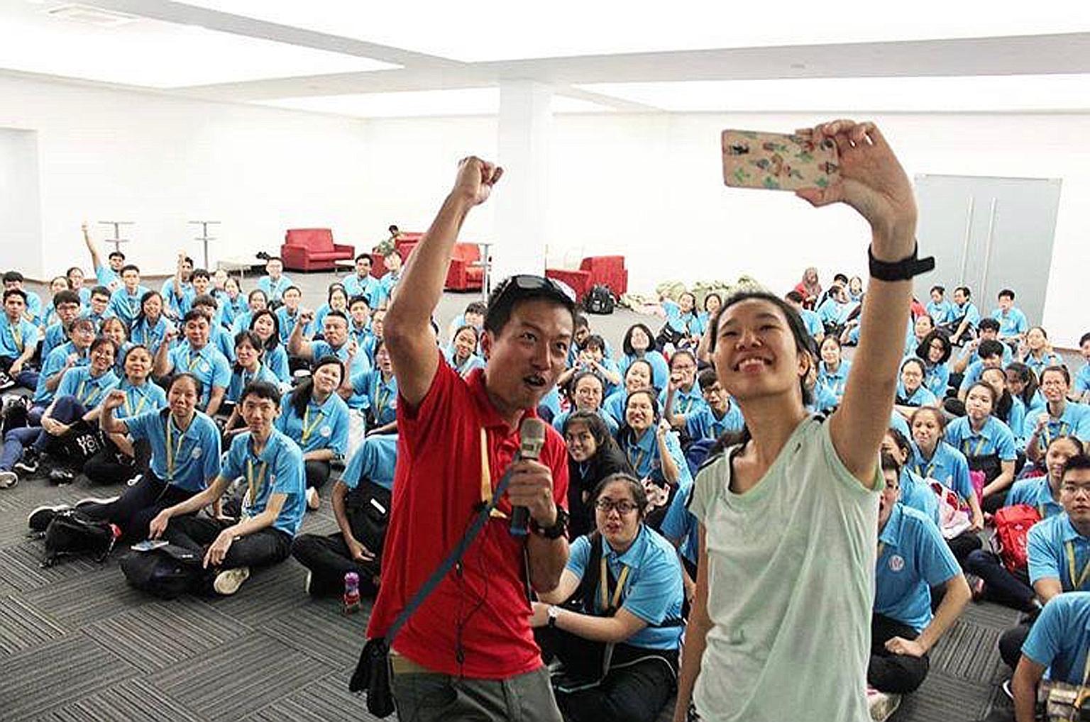 Zero Waste SG manager Pek Hai Lin with chairman of the NDP 2019 logistics and finance committee, Military Expert 6 Ignatius Tham, at a training session with NDP volunteers on June 22.