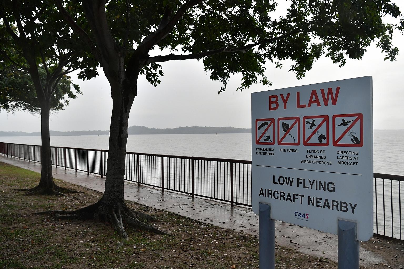 A sign at Changi Beach warning against the flying of drones and other activities that would affect flights at nearby Changi Airport. Public and industry feedback will be sought before the Unmanned Aircraft Systems Advisory Panel makes its recommendat