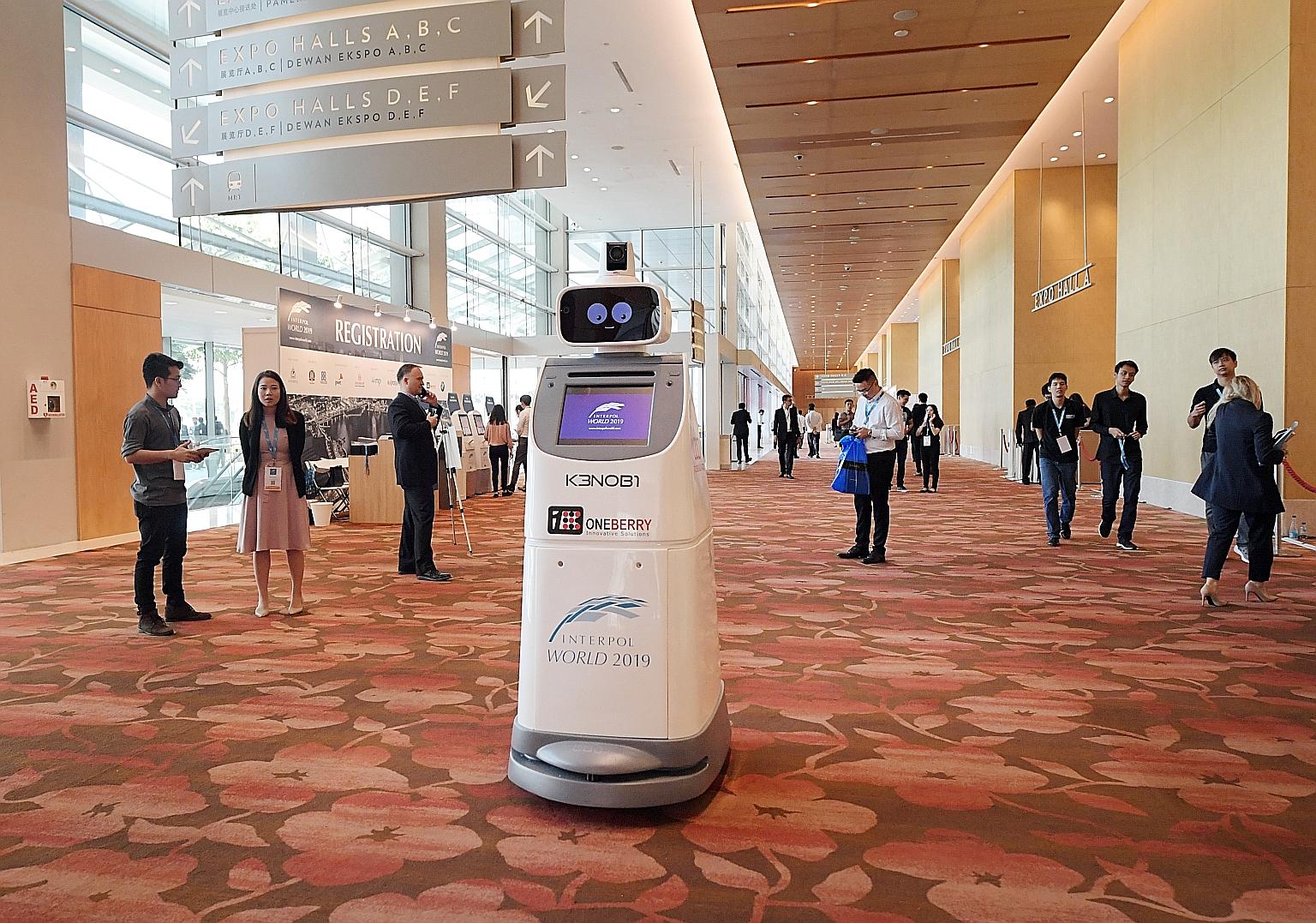 Robot security guard KenOBI deployed by OneBerry Technologies at the Interpol World conference at Marina Bay Sands yesterday.