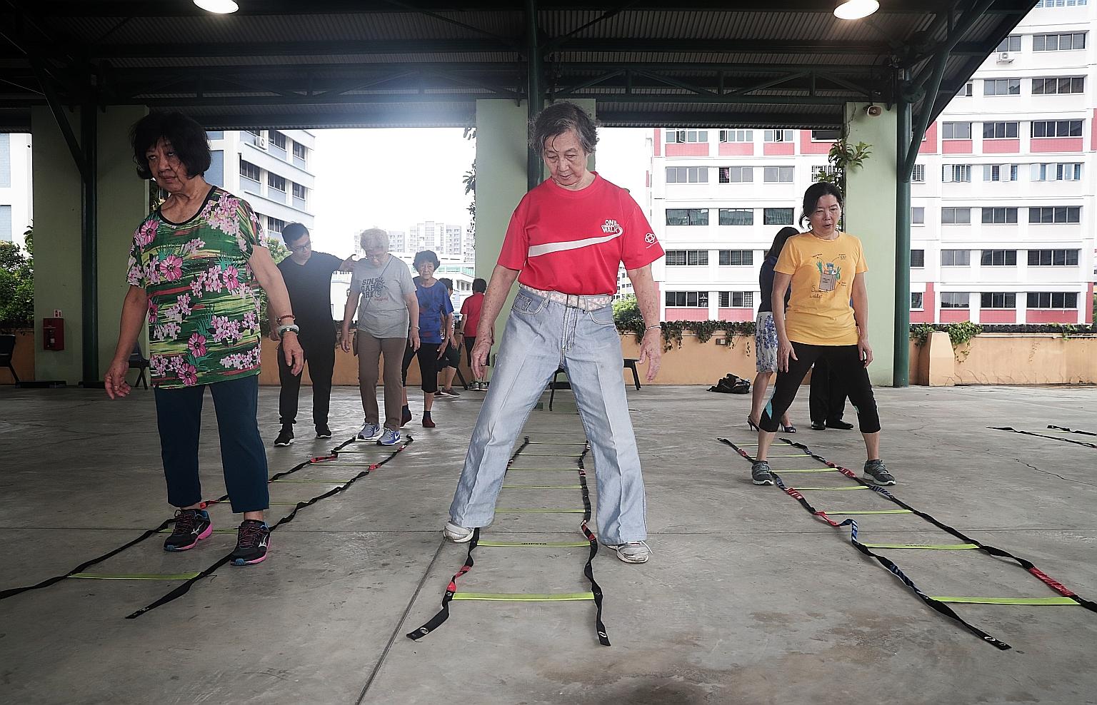 A group of seniors taking part in the Healthy Ageing Promotion Programme For You. The programme has helped many seniors become less frail and have better memory scores, researchers have found. They also improved their walking speed and balance and we