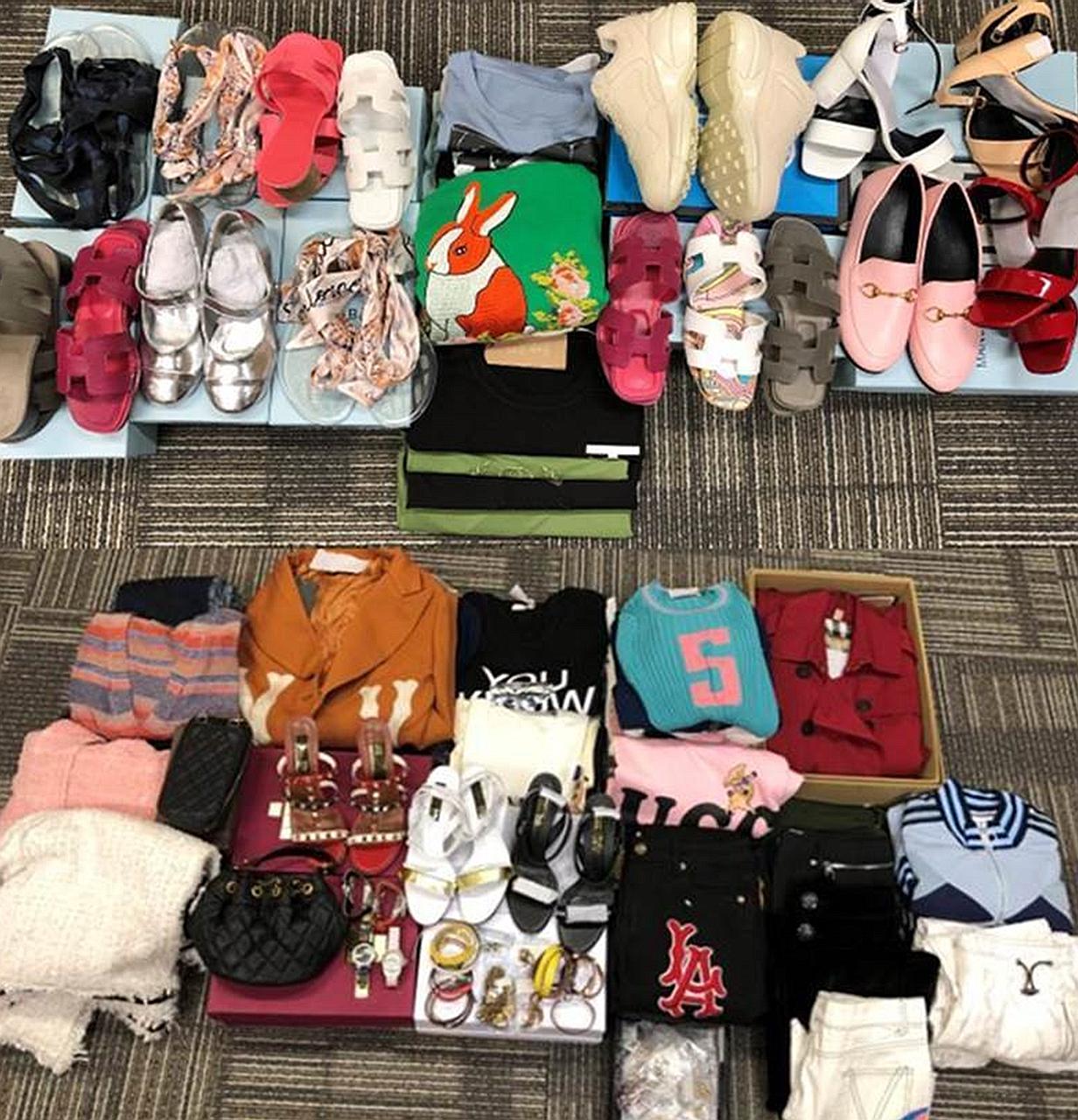 Over 500 pieces of fake luxury goods such as footwear, watches and bags were seized in raids on seven retail outlets.