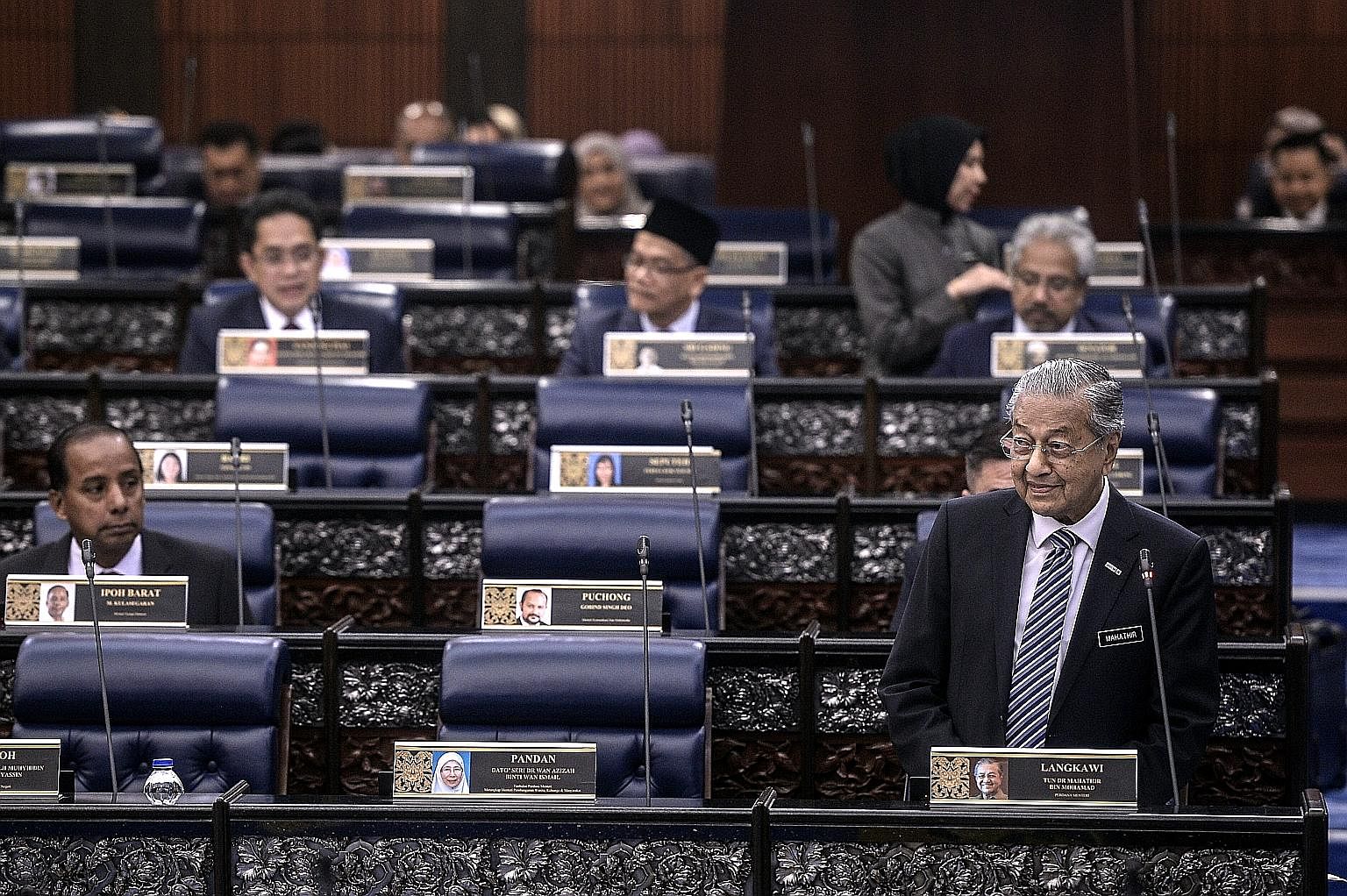Malaysian Prime Minister Mahathir Mohamad marked his 94th birthday yesterday with a busy day in Parliament. The sprightly nonagenarian took questions at a Prime Minister's Question Time session, briefed opposition leaders on a proposal to lower the v