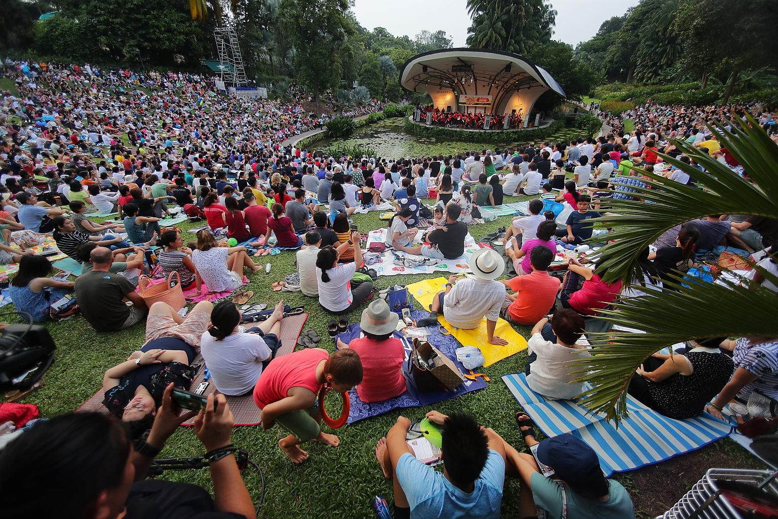 Attendees at the Straits Times Concert in the Gardens last year. The hour-long concert this year will see the Singapore Symphony Orchestra performing a selection of classics. Freebies will be distributed from 4pm. ST FILE PHOTO