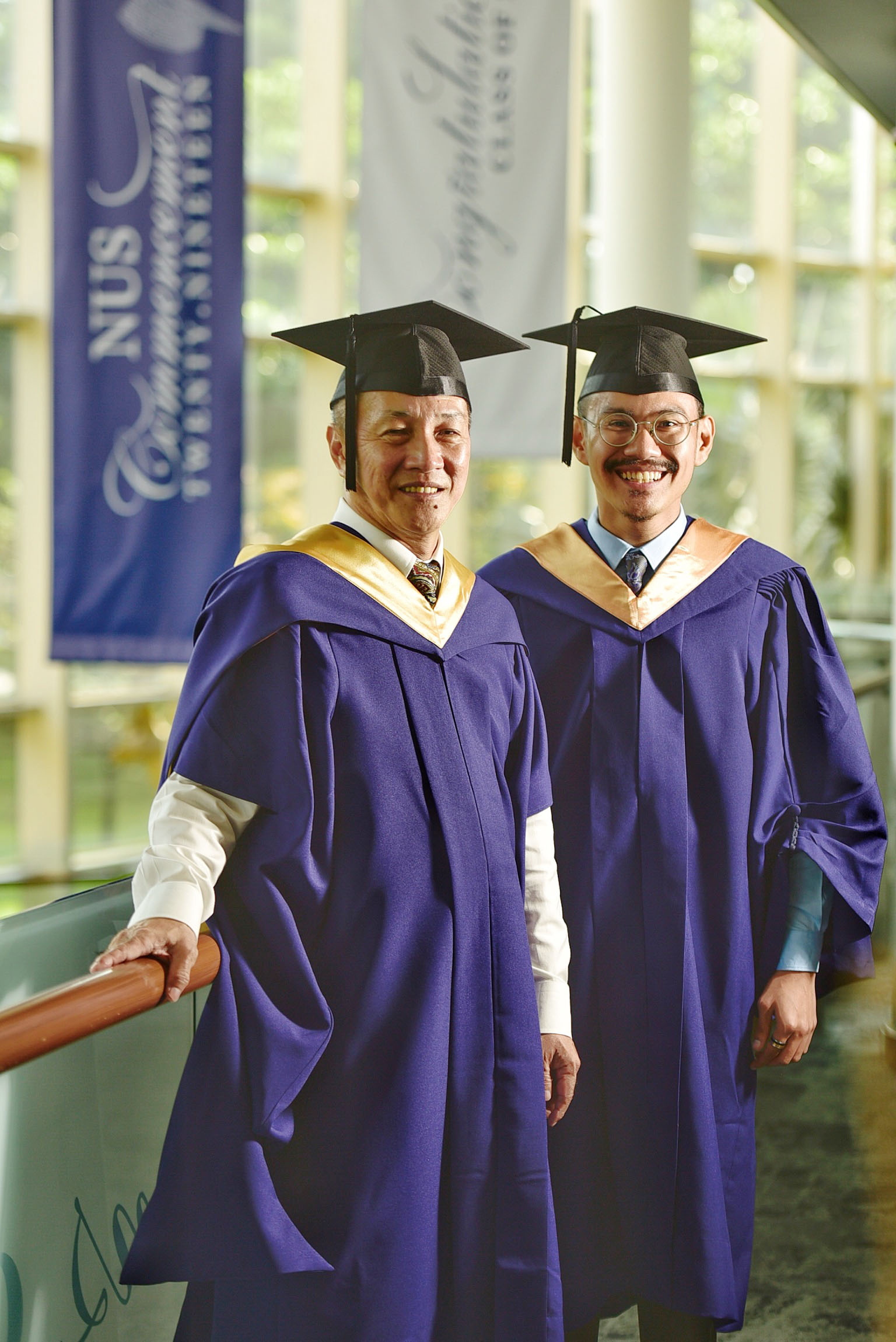 Mr Victor Lim (far left) and Mr Firdaus Hair at the University Cultural Centre in the National University of Singapore on Wednesday. Mr Lim received a Master of Science (Real Estate) yesterday, and Mr Firdaus will receive a Bachelor of Social Science