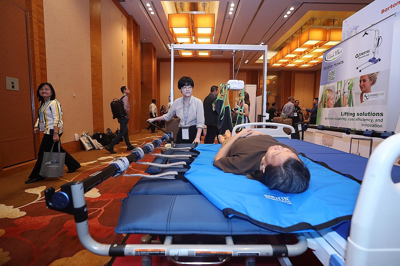 The Barton Convertible Chair, which transforms a stretcher into an upright chair, on show at the Social Service Summit yesterday.