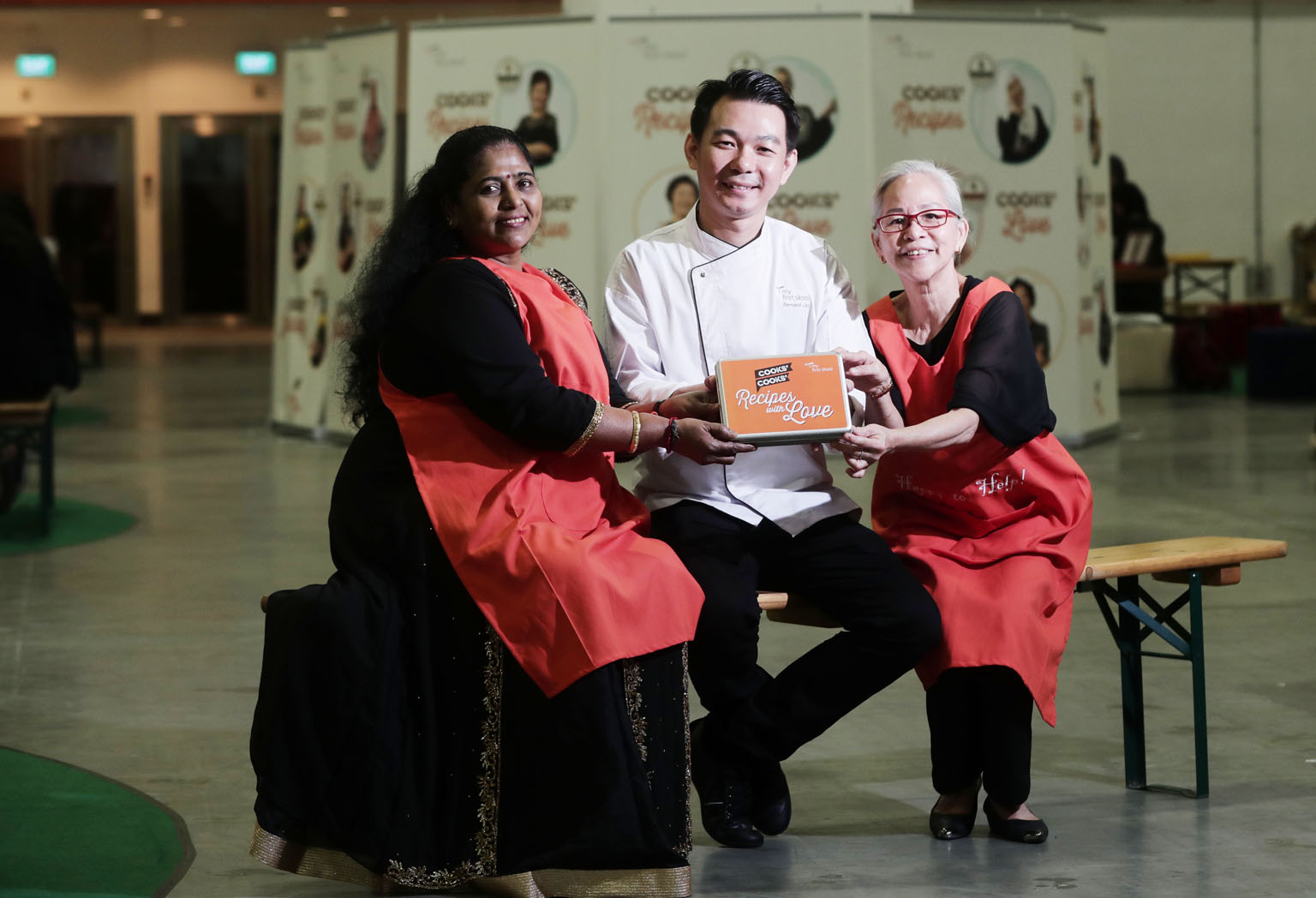 Madam Sakunthla Chelladurai, Mr Bernard Lim and Madam Ng Mee Lan are among 21 chefs and cooks featured in Recipes With Love, a set of 21 recipe cards of healthy meals for children compiled by dietitians and nutritionists. ST PHOTO: KELVIN CHNG