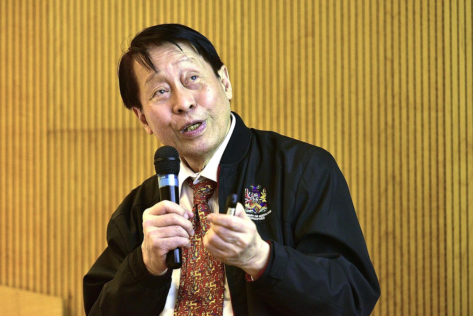Dr Gabriel Oon delivering a lecture at Duke-NUS Medical School on July 4, when he recounted his team's journey to end the hepatitis B epidemic here.