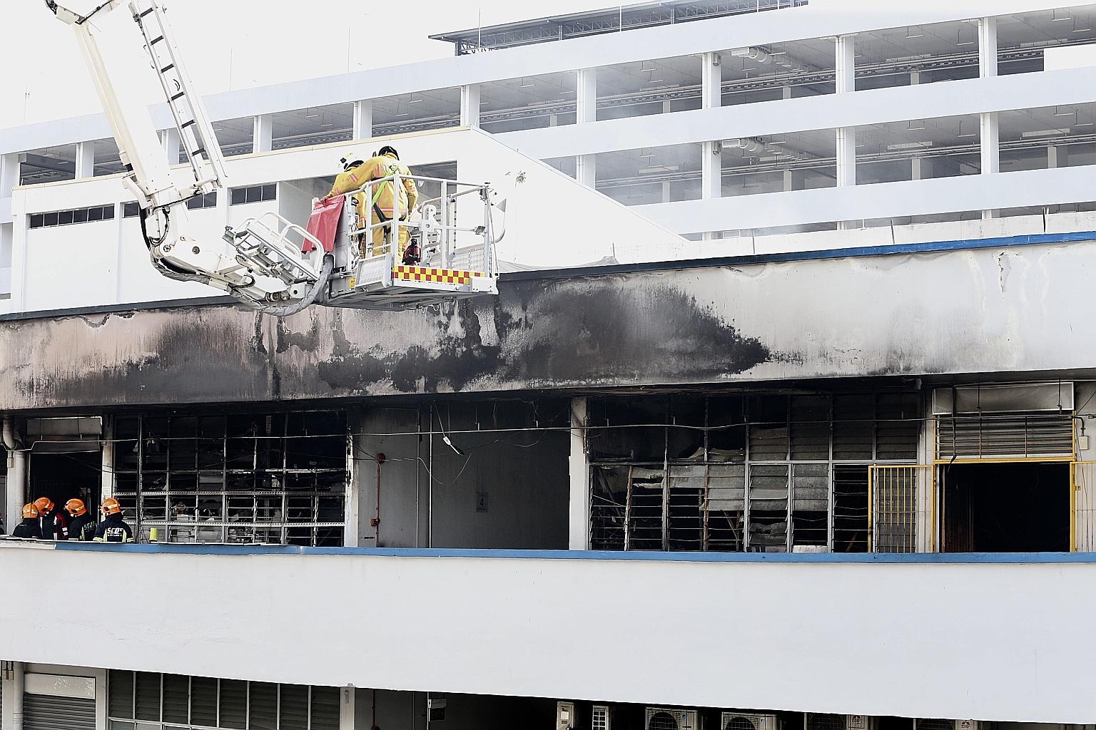 The Singapore Civil Defence Force took about three hours to extinguish the fire. PHOTO: LIANHE ZAOBAO