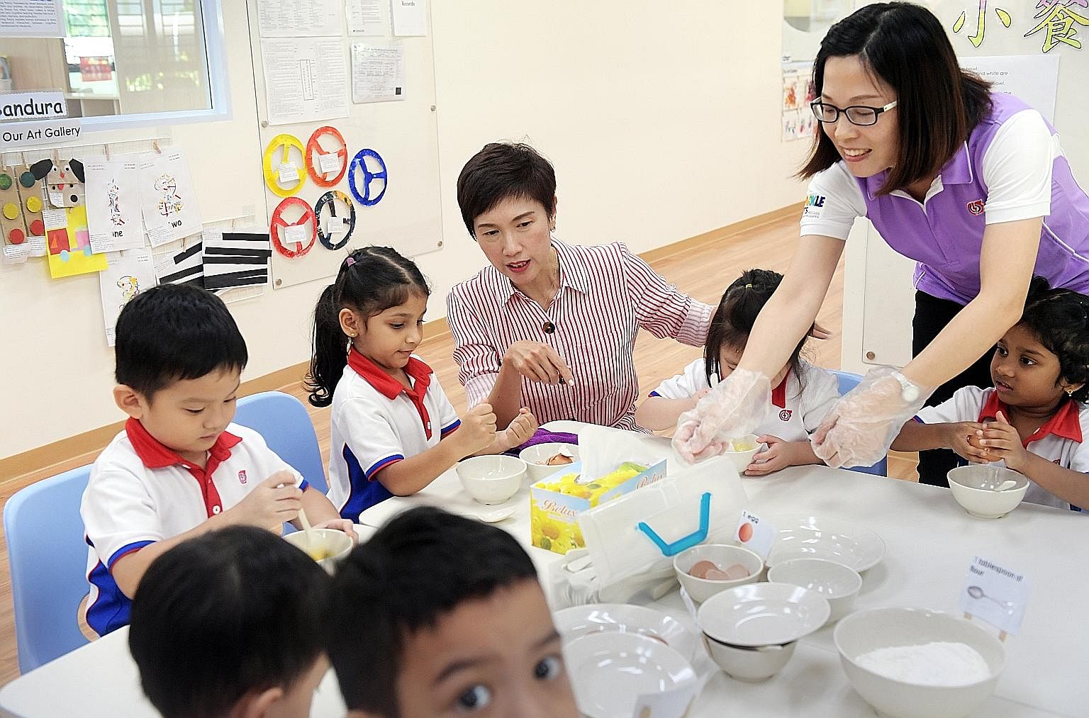 Manpower Minister Josephine Teo at a PCF Sparkletots pre-school earlier this month. She says birth rates are influenced more by values and attitudes on parenthood, which do not change much in the short term. ST PHOTO: ALPHONSUS CHERN