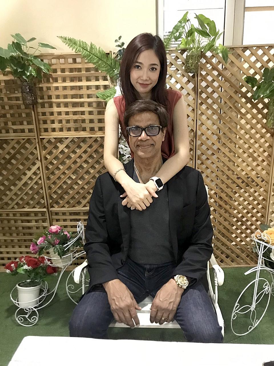 Dr Gobinathan Devathasan, 70, with his new wife, 33-year-old Thai-born Leena Soalsung, whom he married last month. PHOTO: COURTESY OF GOBINATHAN DEVATHASAN