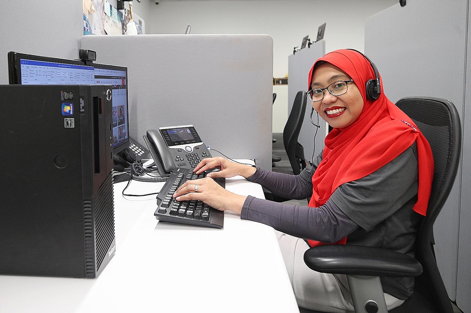 Ms Nahariah Mohd Nor's job as a customer service officer now involves monitoring video teller machines from an operations room rather than bank-teller work at a DBS branch. Prime Minister Lee Hsien Loong urges other firms to emulate DBS in helping th