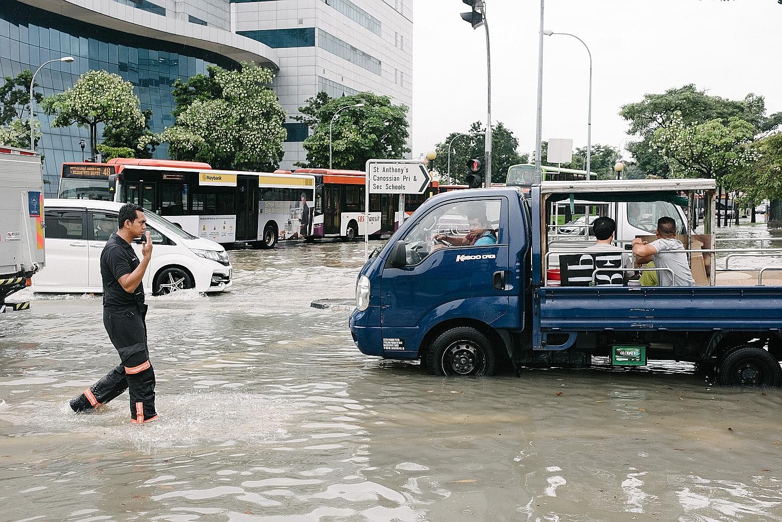 Above: Old flooding problems have largely been resolved, says PM Lee Hsien Loong, with an improved drainage system, among other measures. But climate change presents new challenges. Left: In education, full-day preschool capacity has been doubled to 